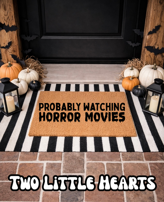 Probably watching horror Doormat